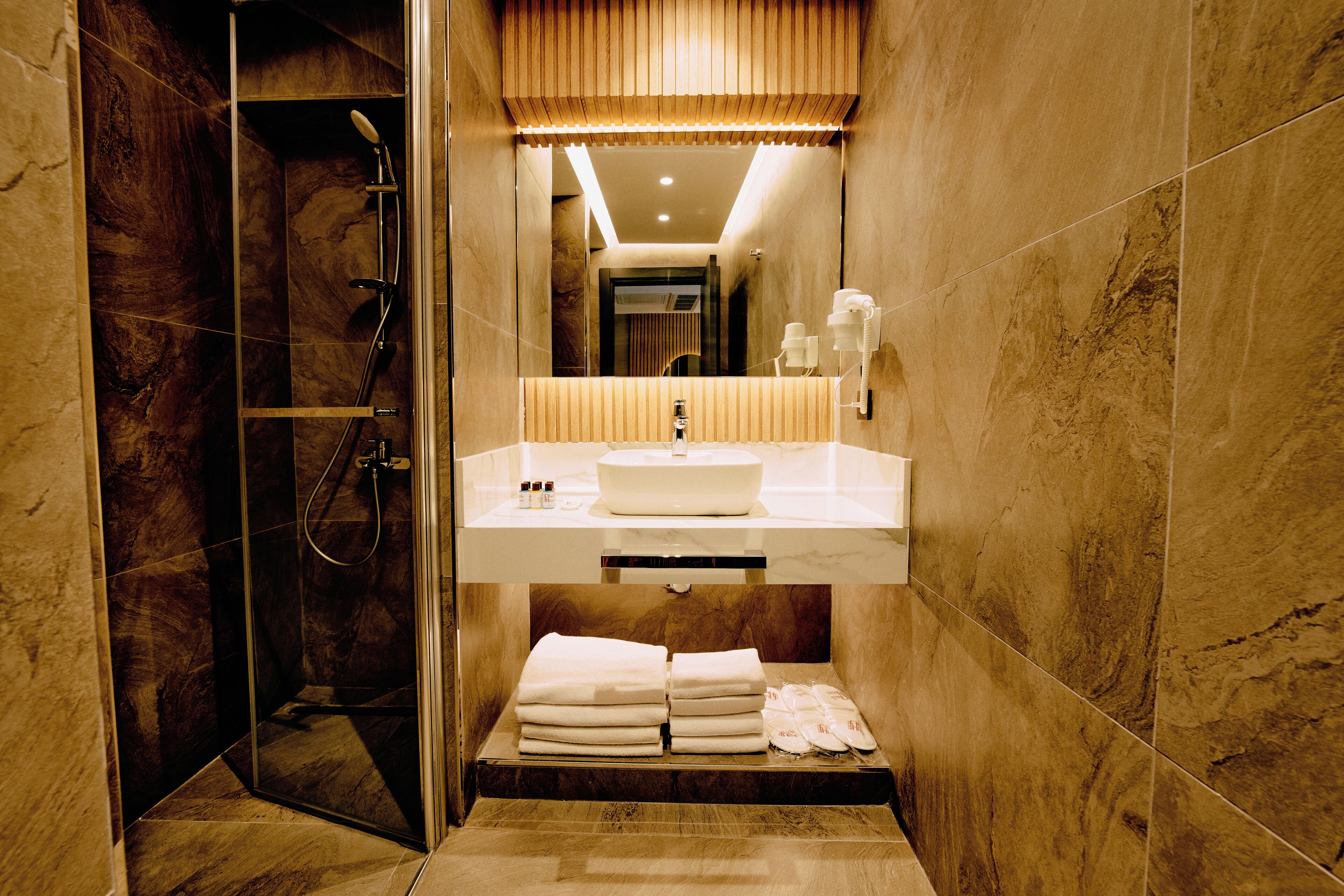 Free toiletries, hair dryer, bathrobes, slippers