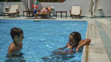 Outdoor pool, pool umbrellas, sun loungers