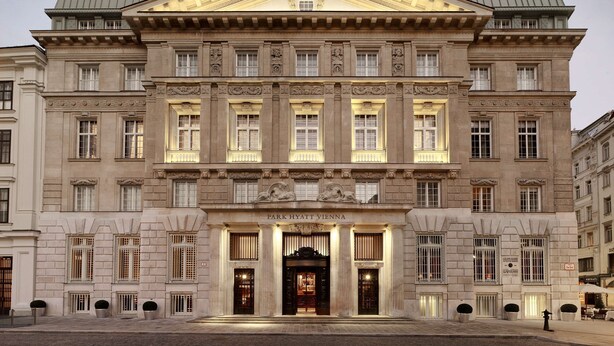 A large, historic building with a grand entrance, columns, and a sign reading "Park Hyatt Vienna." - Park Hyatt Vienna (Vienna)