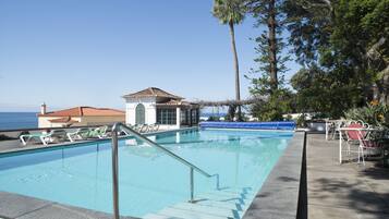 2 outdoor pools, pool umbrellas, sun loungers
