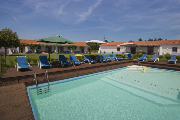 Outdoor pool, pool umbrellas, pool loungers
