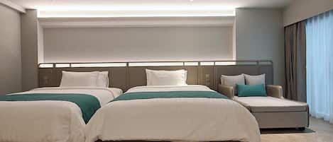 Twin Queen In | 1 habitación, caja de seguridad en la habitación y escritorio