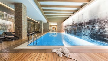 Indoor pool, open 7:00 AM to 10:00 PM, sun loungers