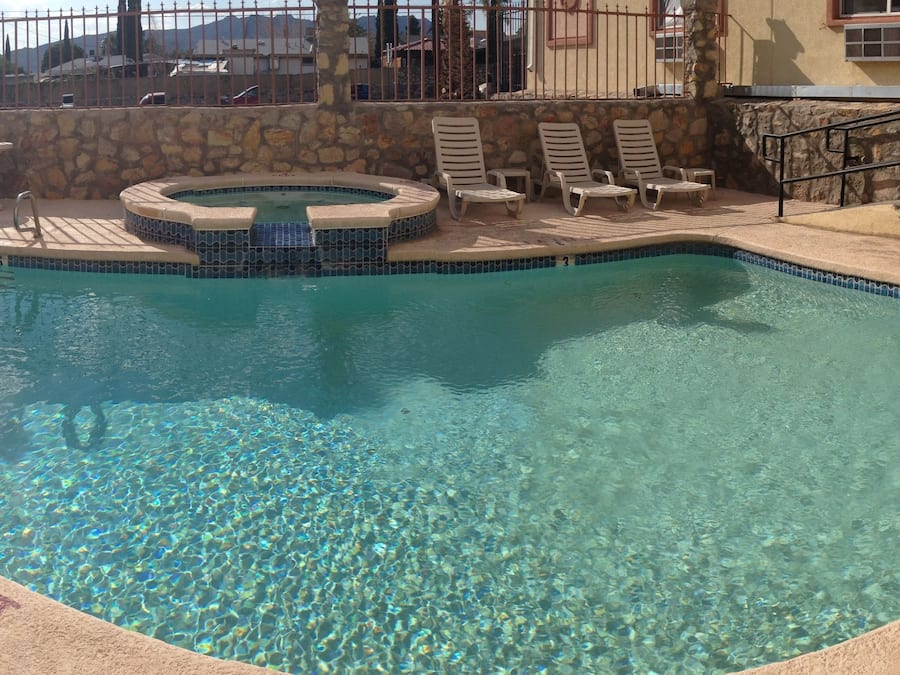 Seasonal outdoor pool, pool loungers