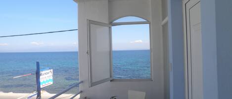 Suite, uitzicht op zee | Balkon