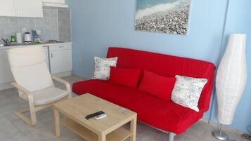 Apartment, 2 Bedrooms, Partial Sea View | Living room | Plasma TV, table tennis