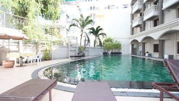 Outdoor pool, pool umbrellas, pool loungers