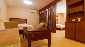Business Room, 2 Single Beds | Living area | 32-inch LCD TV with cable channels, TV, computer