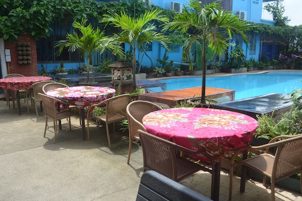 Breakfast, lunch, dinner served; pool views