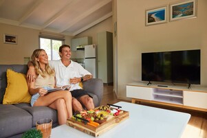 Ropa de cama de alta calidad y tabla de planchar con plancha