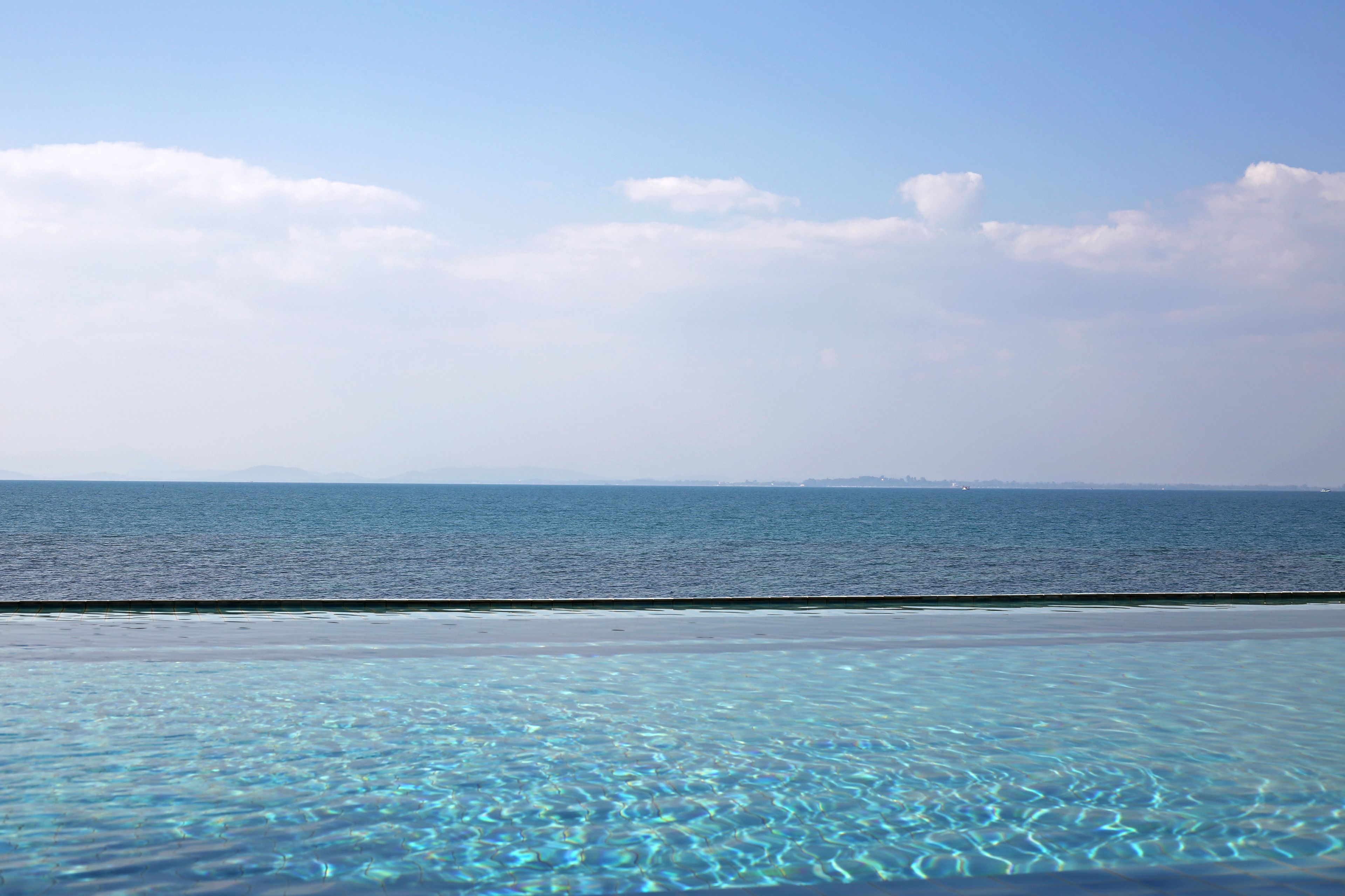 outdoor pool, open 7 am to 7 pm, pool umbrellas, pool loungers