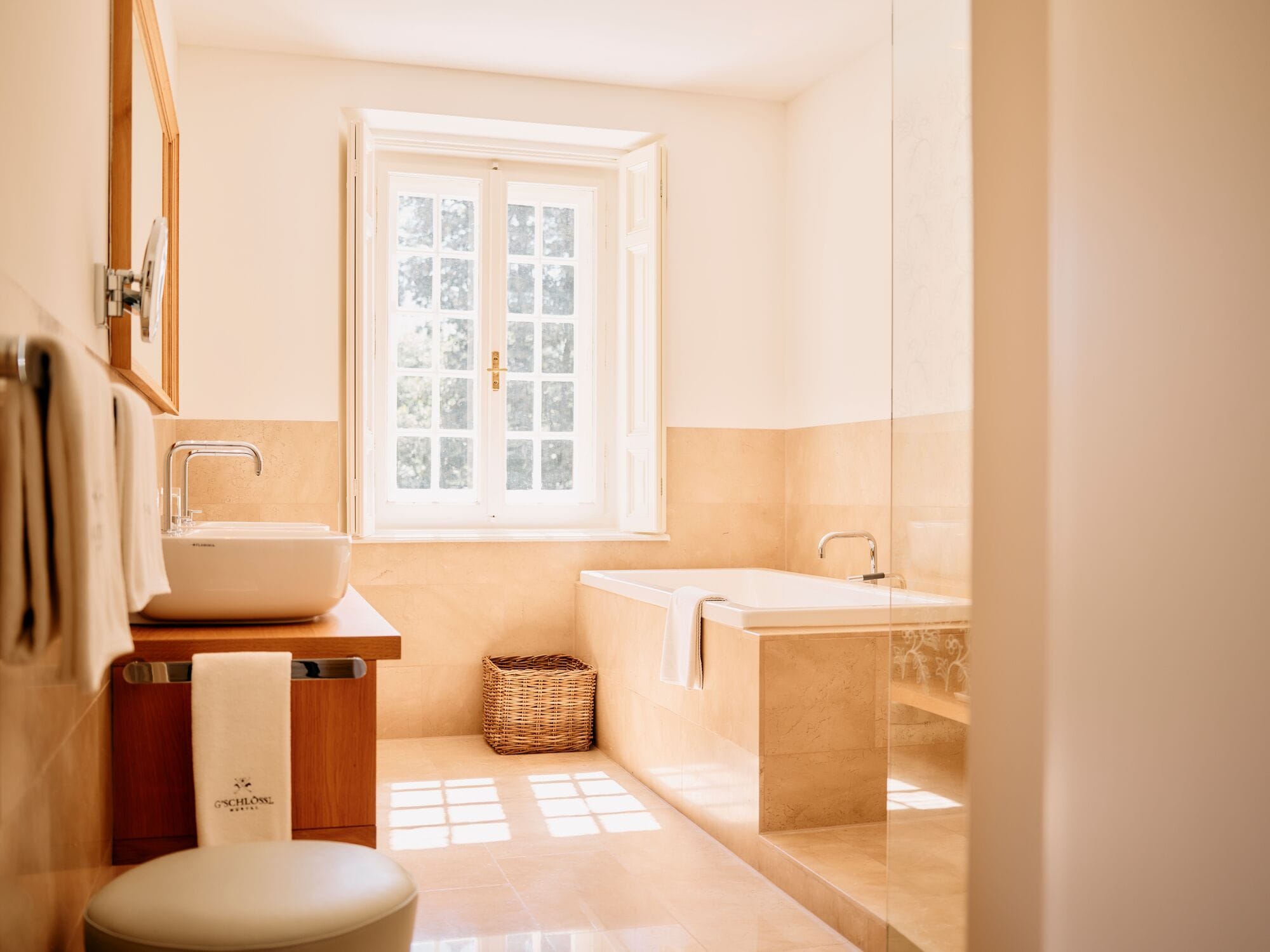 deluxe suite, 1 king bed | bathroom | hair dryer, bathrobes, slippers, towels