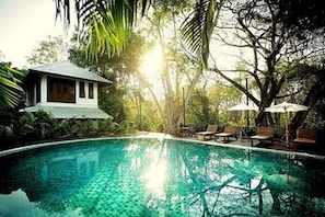 Outdoor pool, pool umbrellas, sun loungers