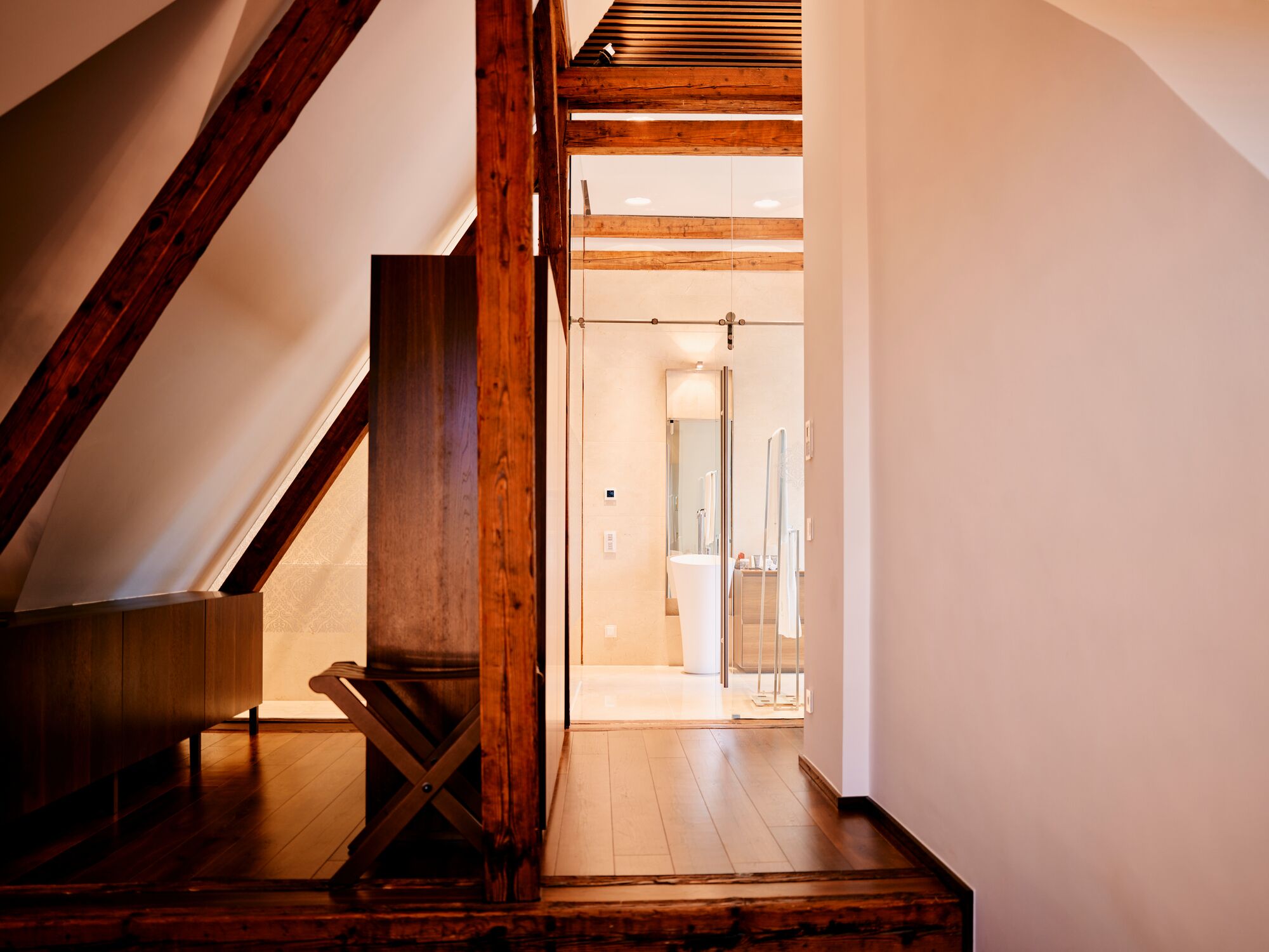 superior suite | bathroom | hair dryer, bathrobes, slippers, towels