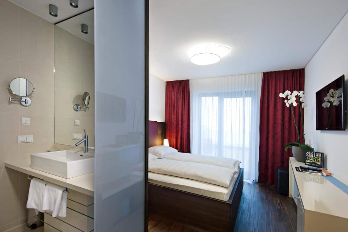 double room | premium bedding, in-room safe, iron/ironing board, free cots/infant beds