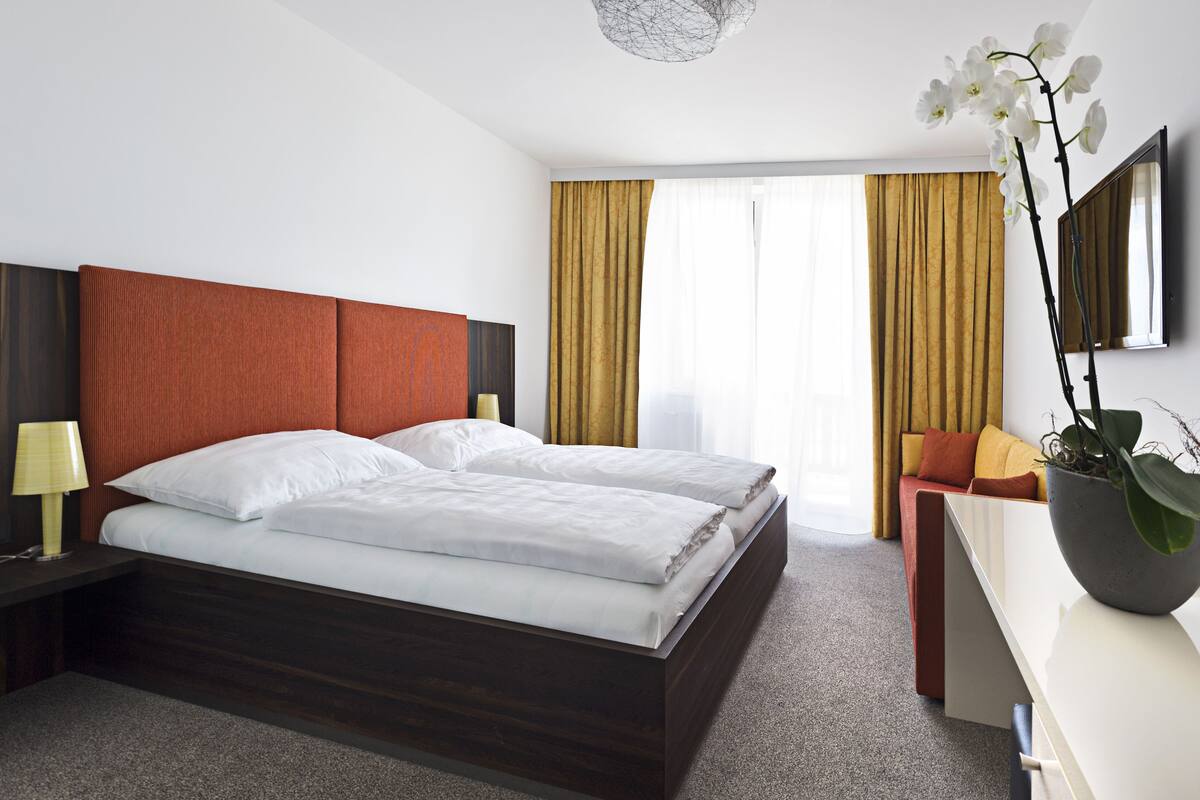 standard double room | premium bedding, in-room safe, iron/ironing board, free cots/infant beds