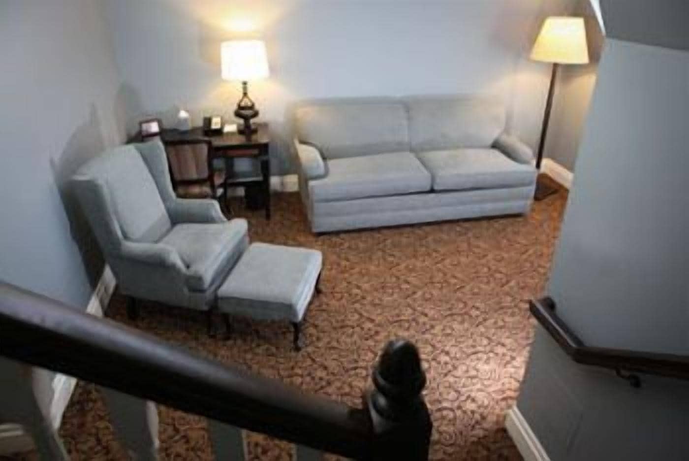 deluxe lofts and suites | living area | 37-inch flat-screen tv with cable channels, tv, ipod dock