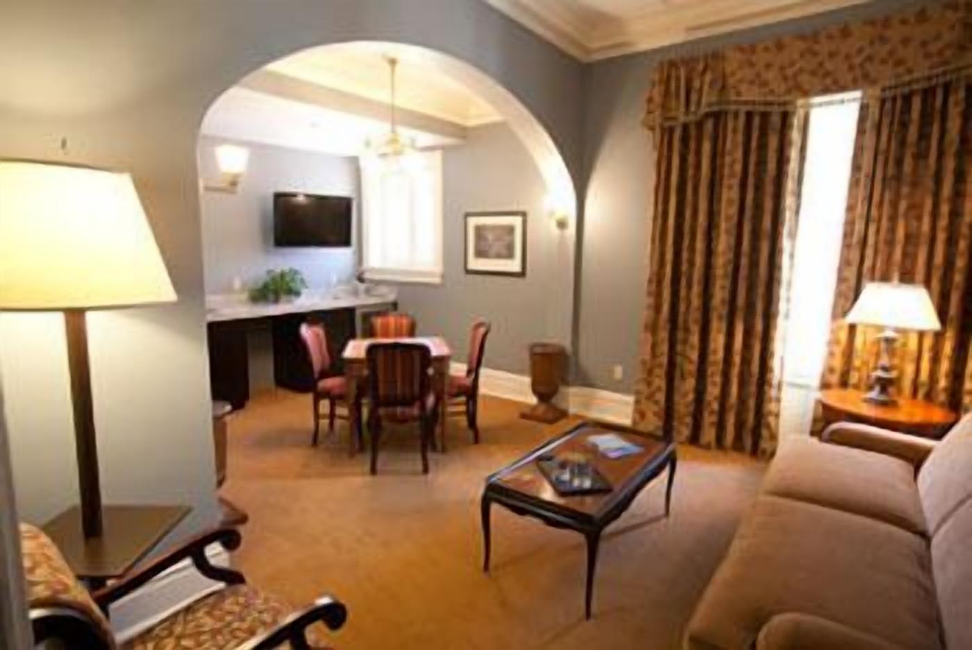 mccook suite, 1 king bed w/ 2 sofabeds (mccook mansion) | living area | 37-inch flat-screen tv with cable channels, tv, ipod dock