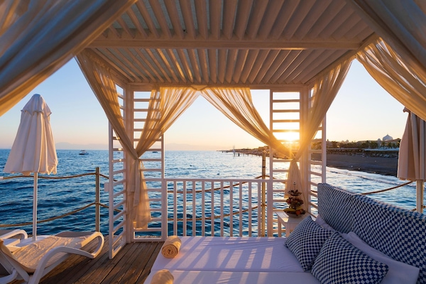 Private beach, sun loungers, beach umbrellas, beach towels