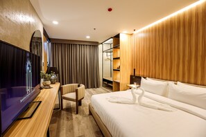 Habitación individual presidencial | Ropa de cama de alta calidad y caja de seguridad en la habitación 