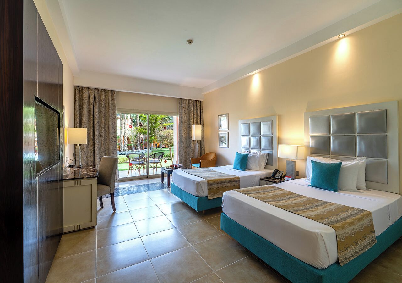 Deluxe Room, Garden Or Pool View | Egyptian cotton sheets, premium bedding, minibar, in-room safe