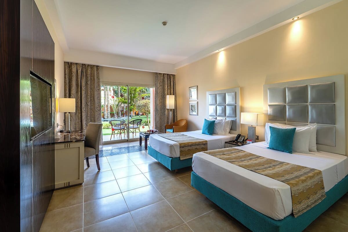 Deluxe Room, Garden Or Pool View | 埃及棉床单、高档床上用品、迷你吧、客房内保险箱