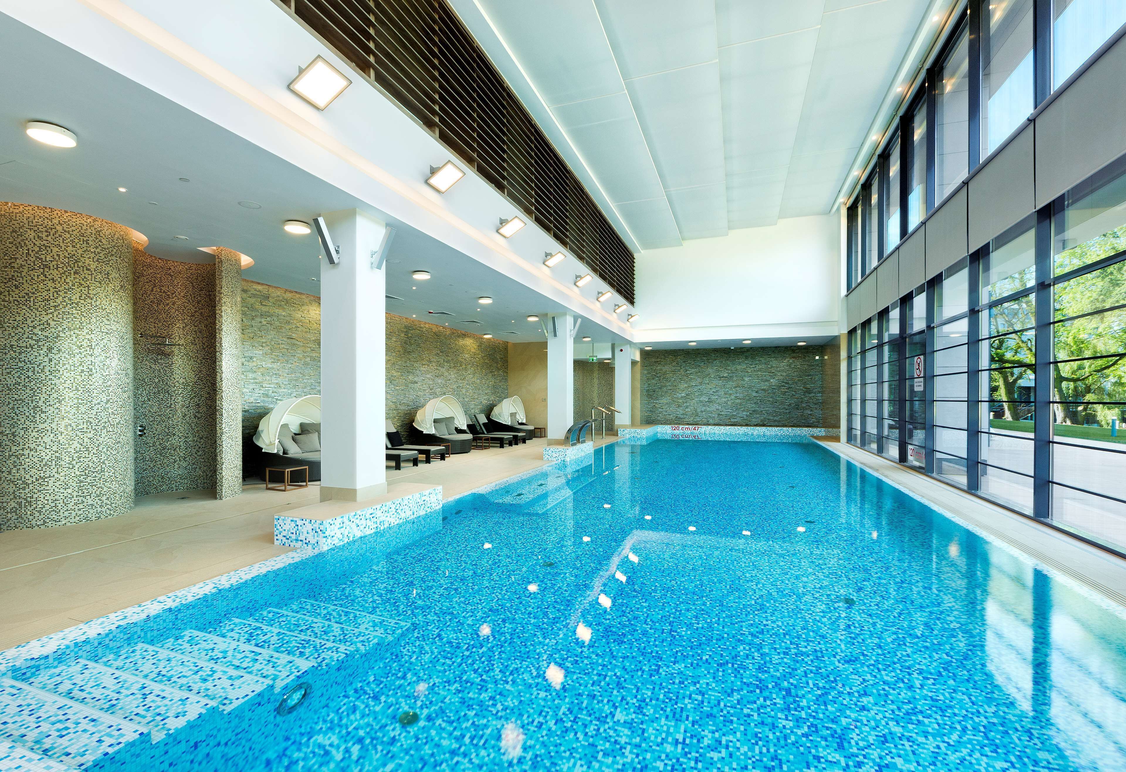 indoor pool, open 7:00 am to 10:00 pm, pool loungers