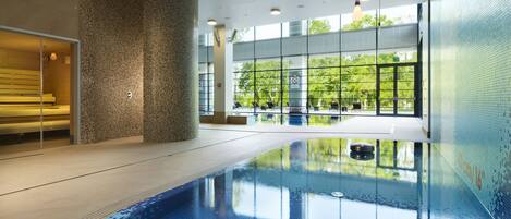 Indoor pool, open 7:00 AM to 10:00 PM, pool loungers