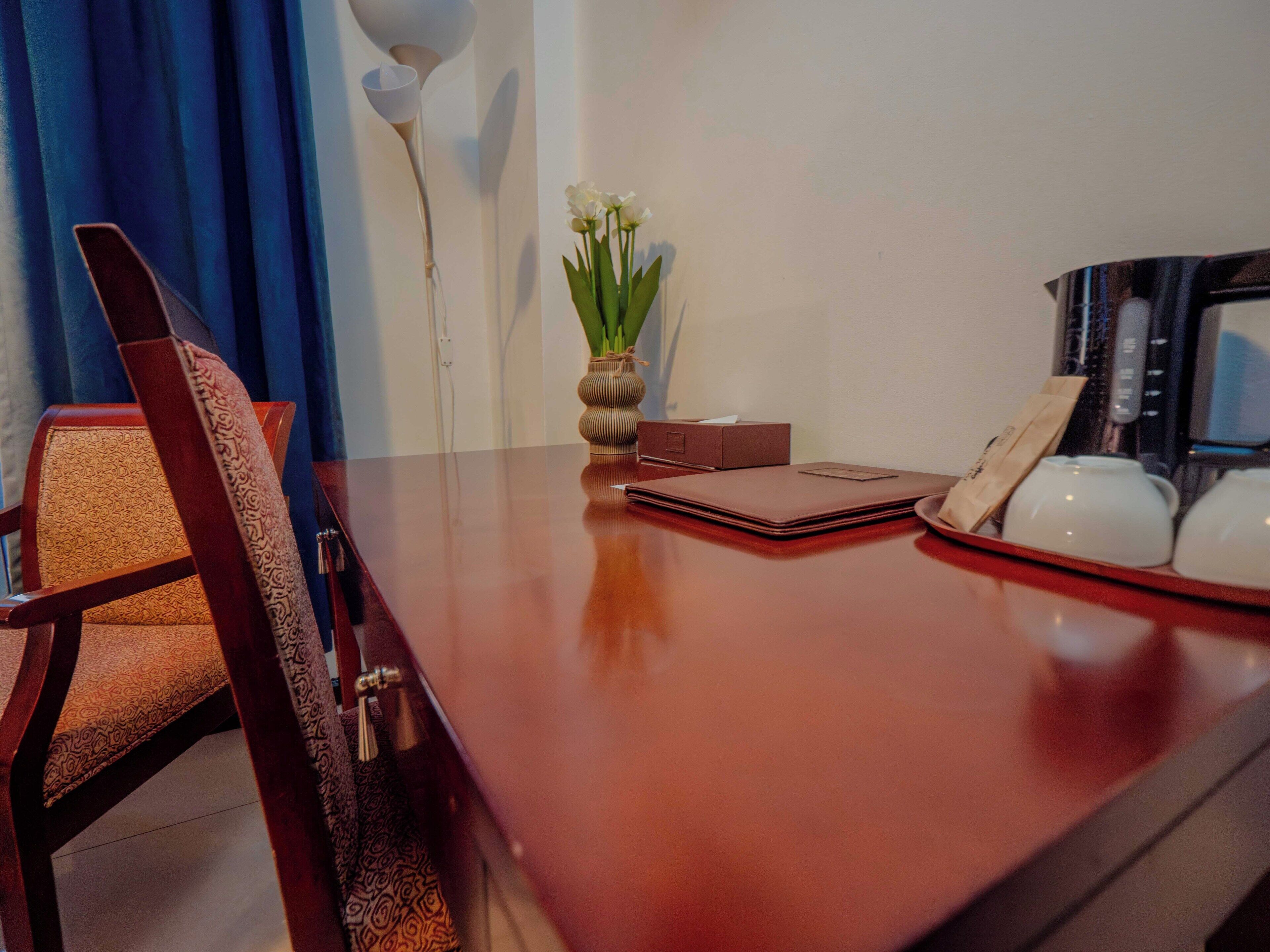 premium quadruple room, 2 queen beds | in-room safe, desk, laptop workspace, blackout curtains