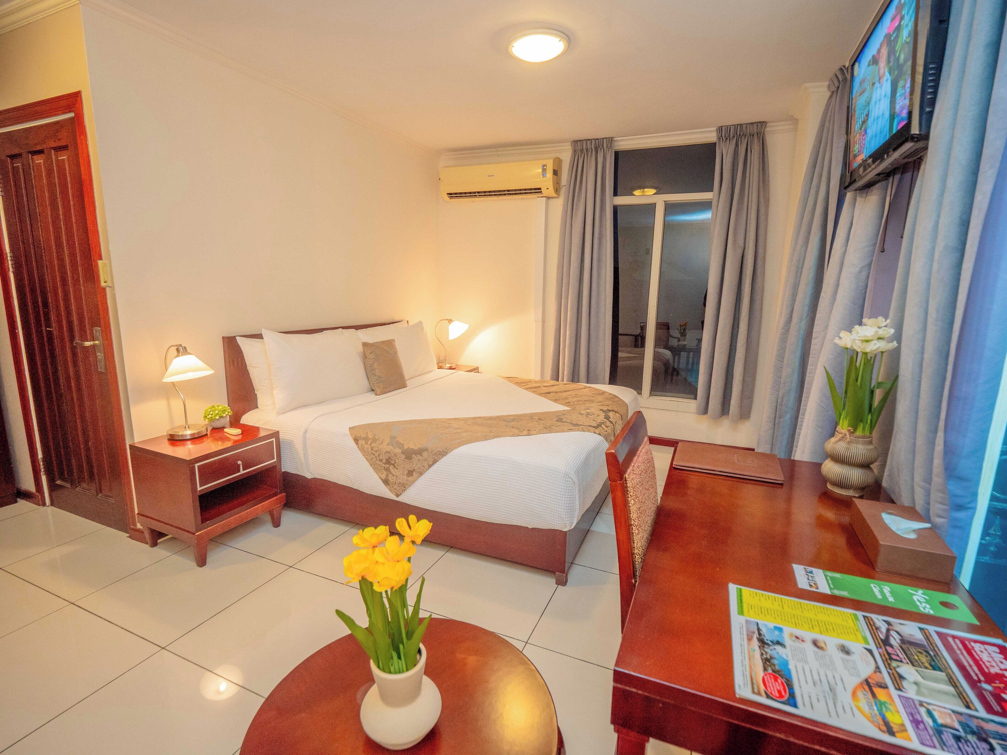 comfort room (king) | in-room safe, desk, laptop workspace, blackout curtains