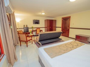 Premium Room, 1 King Bed, City View | In-room safe, desk, laptop workspace, blackout drapes