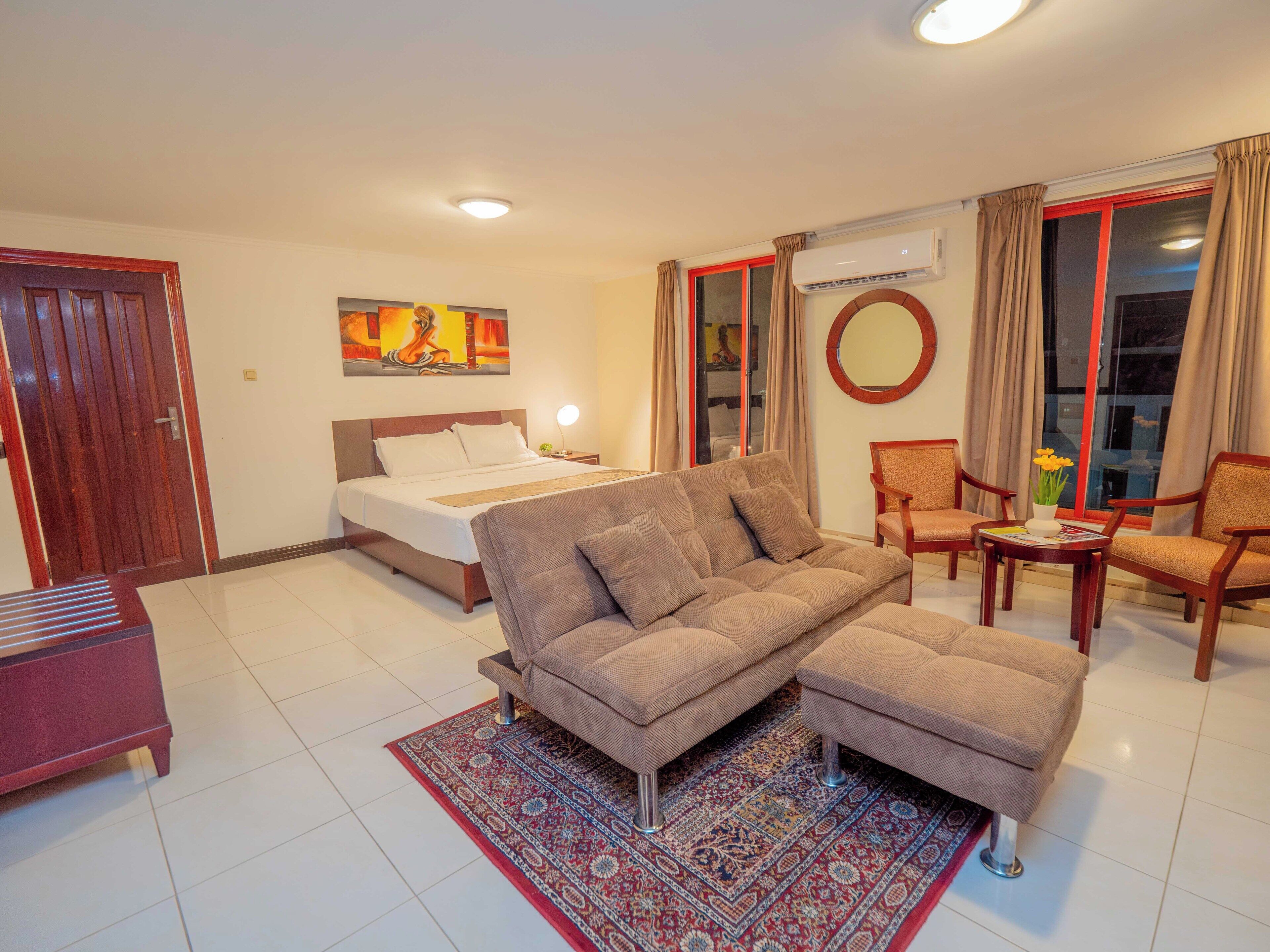 Premium Room, 1 King Bed, City View | In-room safe, desk, laptop workspace, blackout curtains