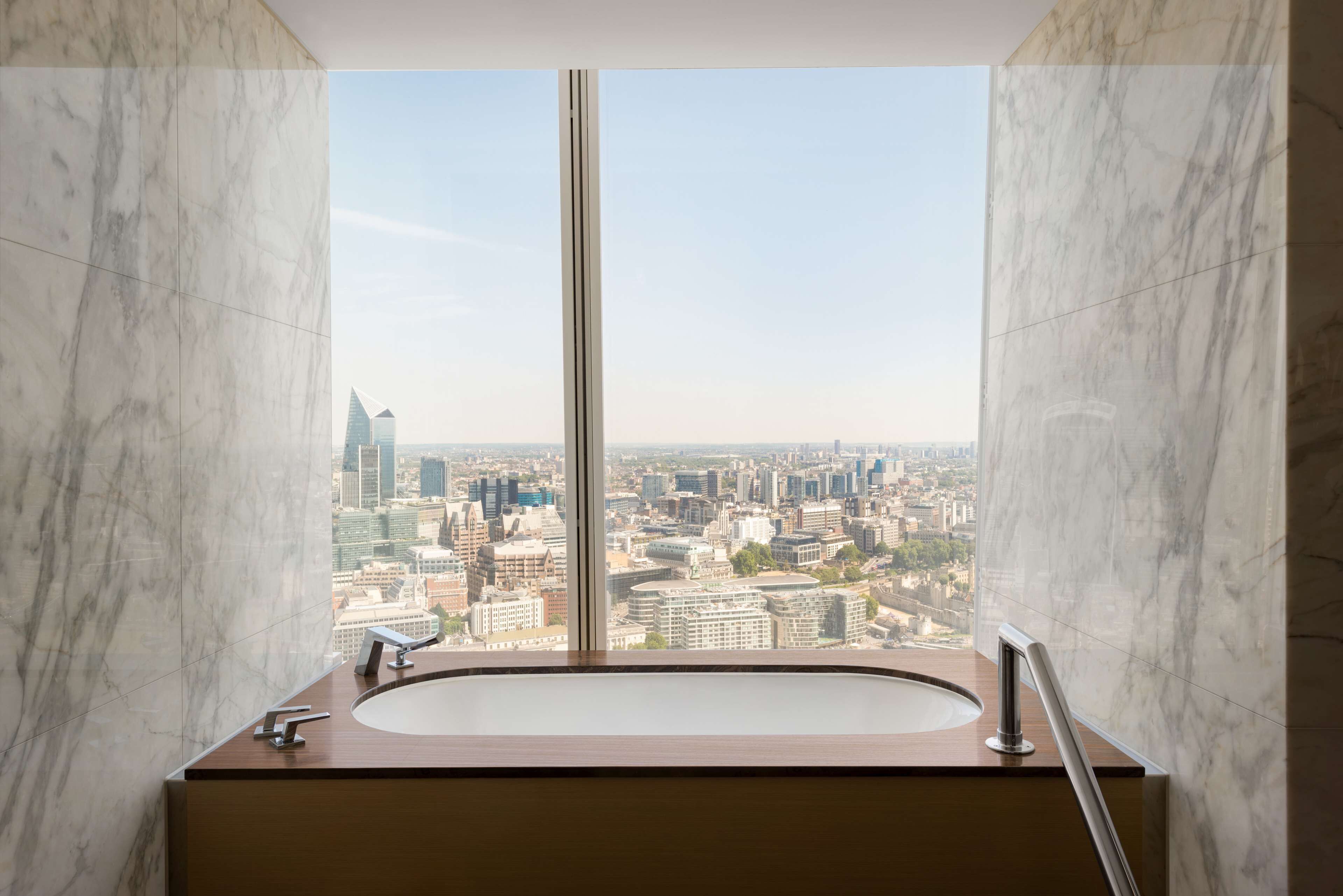 suite (london) | bathroom | separate bathtub and shower, designer toiletries, hair dryer, bathrobes