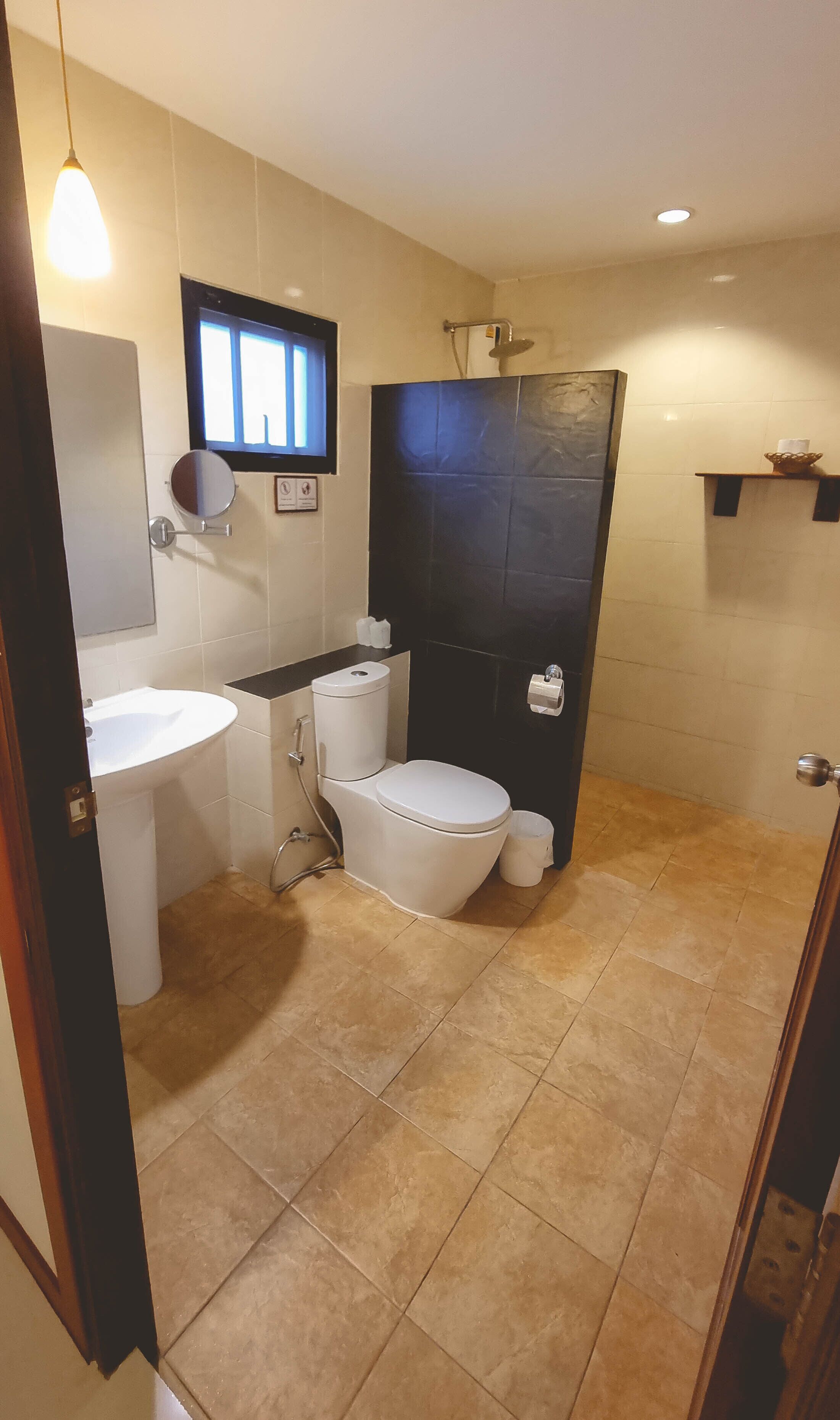 superior room, pool view | bathroom | shower, free toiletries, hair dryer, towels