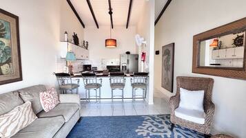 Comfort House, 2 Bedrooms, Partial Ocean View, Ground Floor | Living area | Flat-screen TV