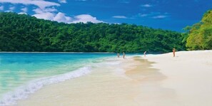 On the beach, free beach cabanas, sun-loungers, beach umbrellas