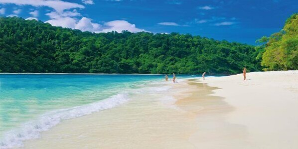 On the beach, free beach cabanas, sun-loungers, beach umbrellas