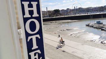 A hotel sign with the word "HOTEL" in large letters.