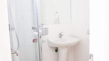 Shower, free toiletries, hair dryer, towels