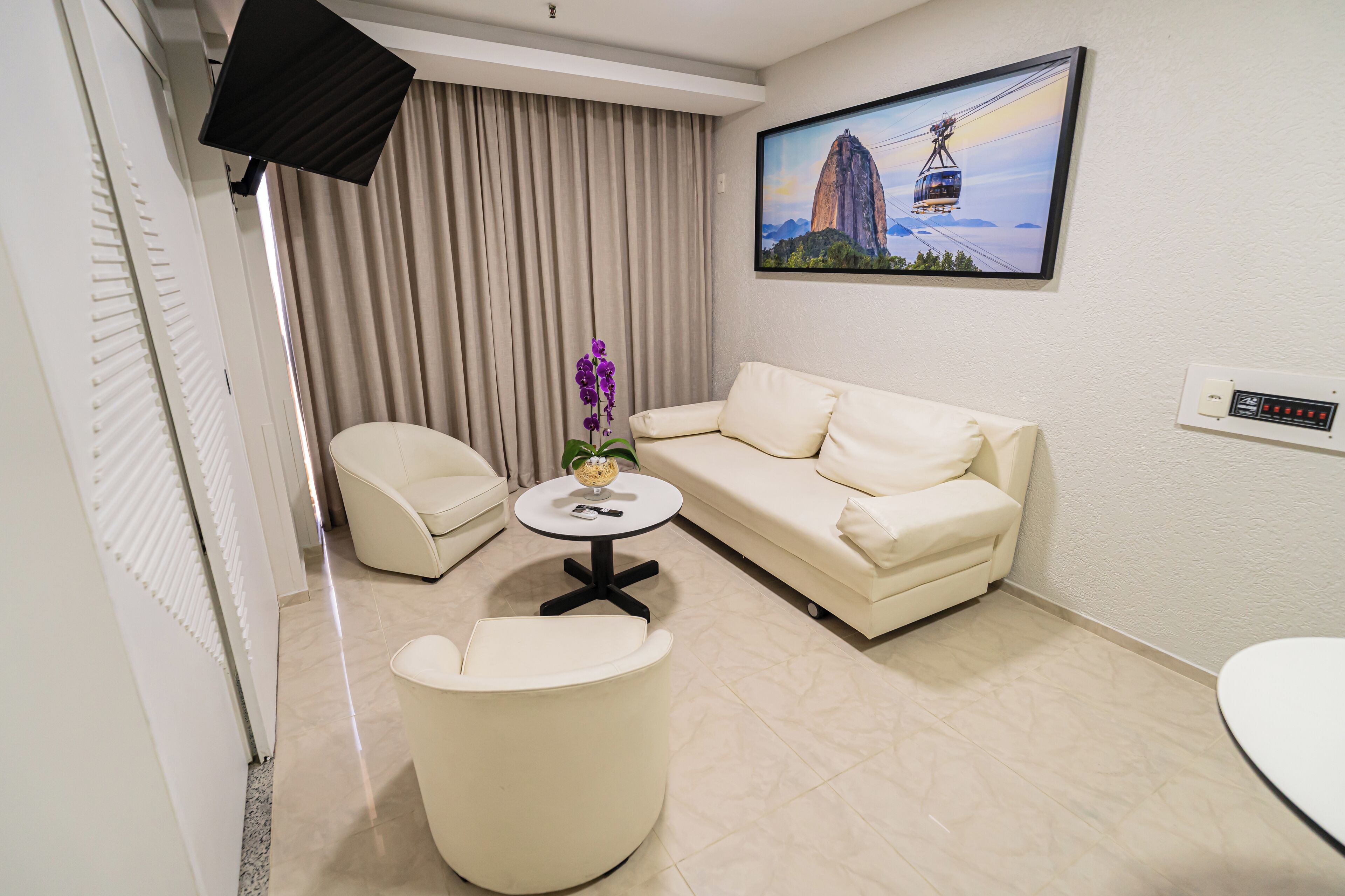 suite | living area | tv