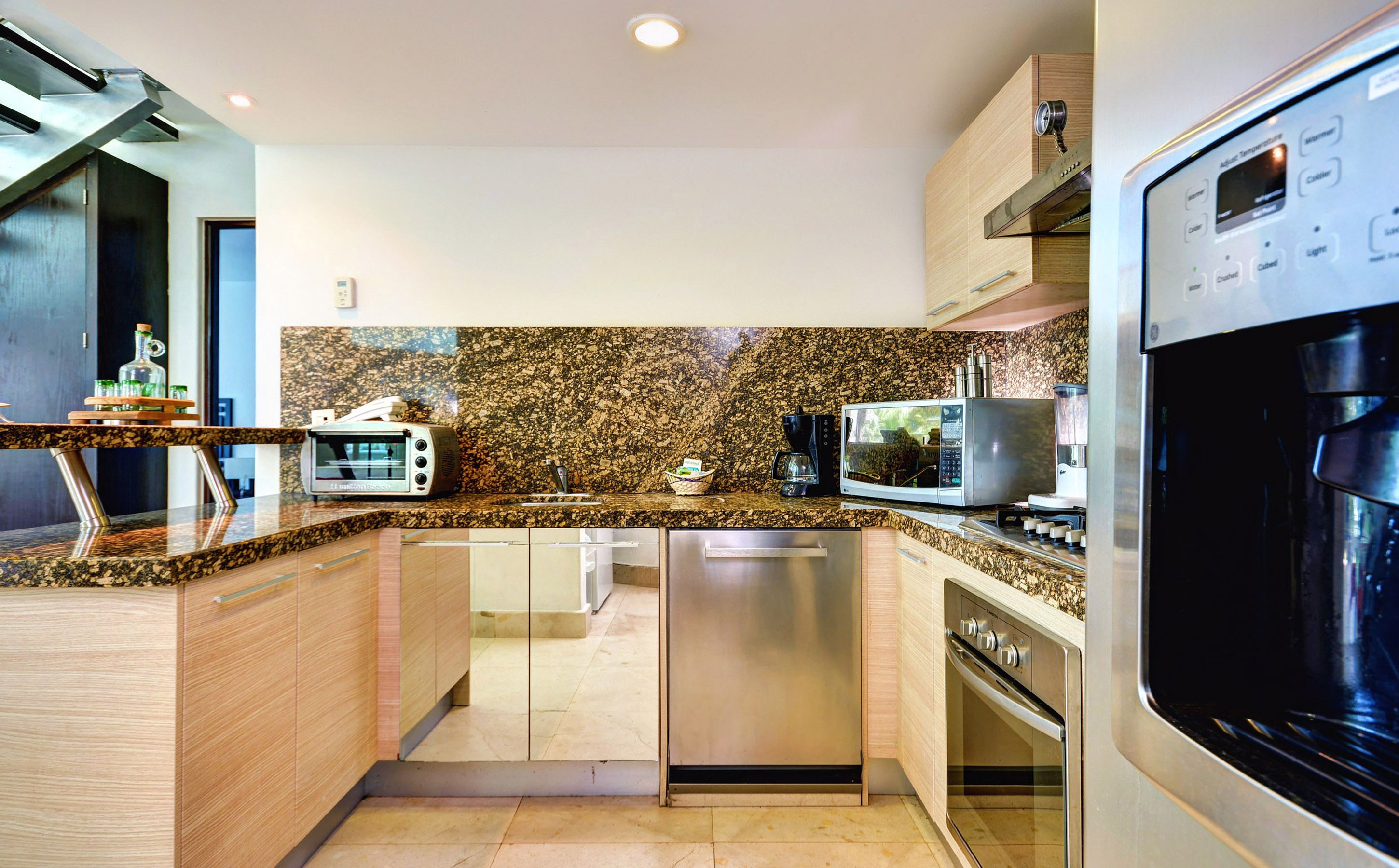 luxury loft genova | private kitchen | full-sized fridge, microwave, coffee/tea maker, blender
