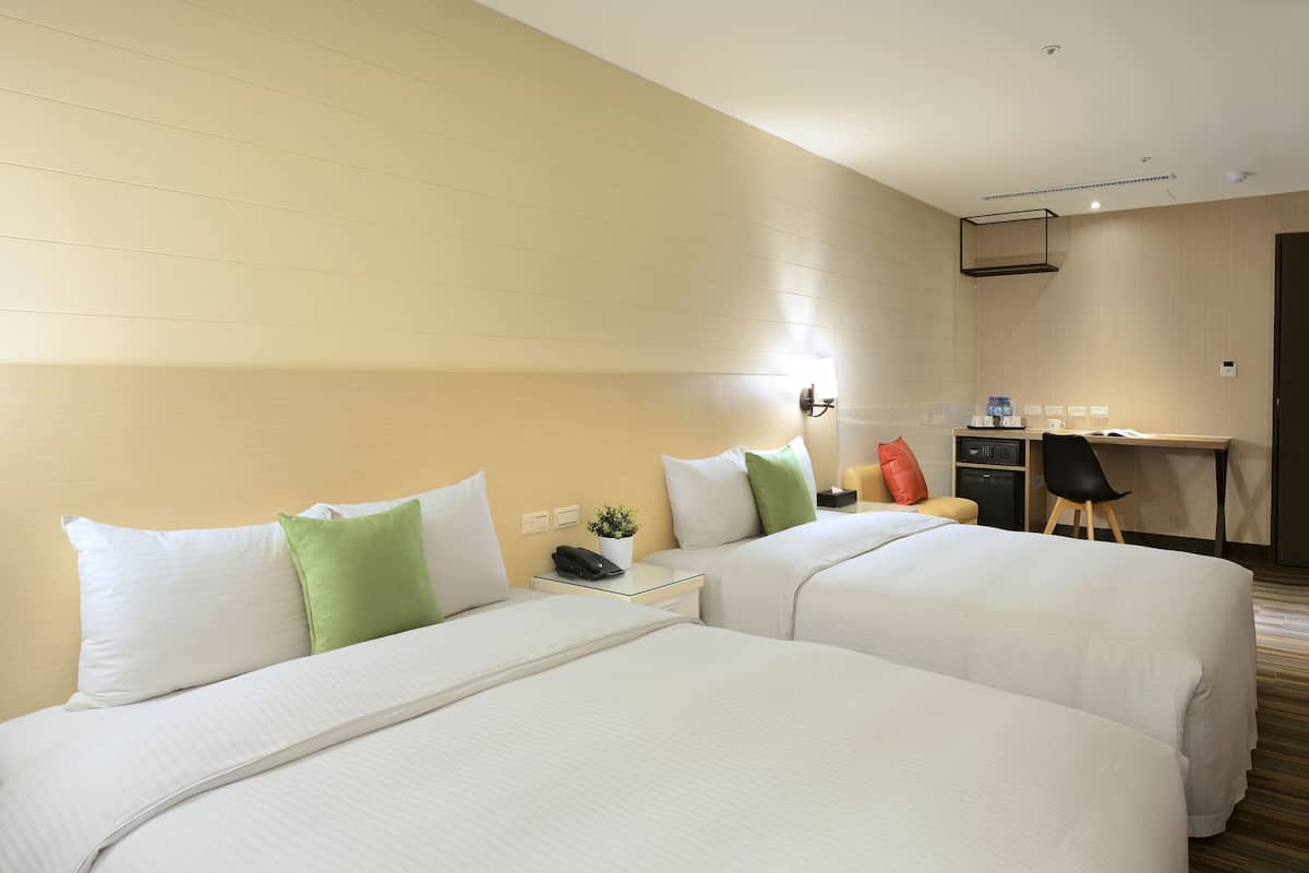 Standard Quadruple Room | Down comforters, pillowtop beds, in-room safe, desk