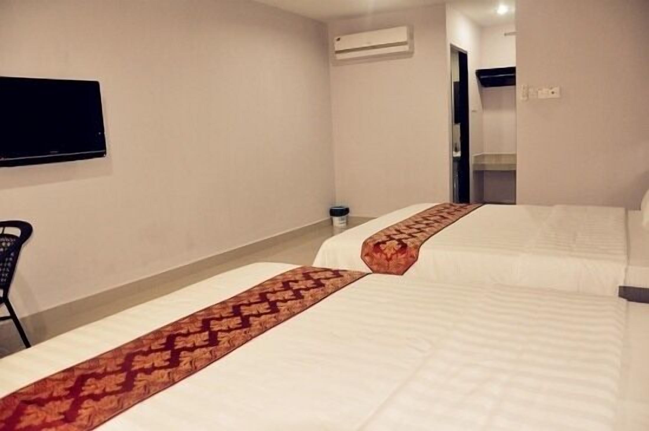 family room | in-room safe, desk, iron/ironing board, rollaway beds