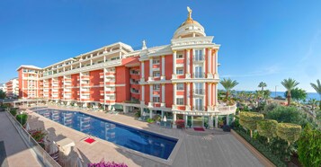 2 outdoor pools, pool umbrellas, sun loungers