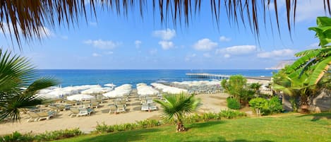 Private beach, sun loungers, beach umbrellas, beach bar