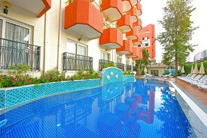 2 outdoor pools, pool umbrellas, pool loungers