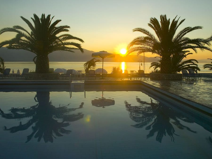 Seasonal outdoor pool, pool umbrellas, pool loungers