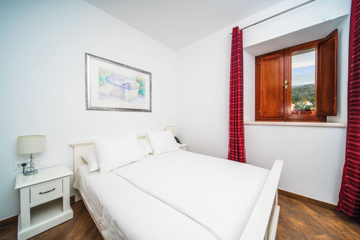 Apartment, 2 Bedrooms, Pool View, Ground Floor | In-room safe, desk, blackout drapes, soundproofing