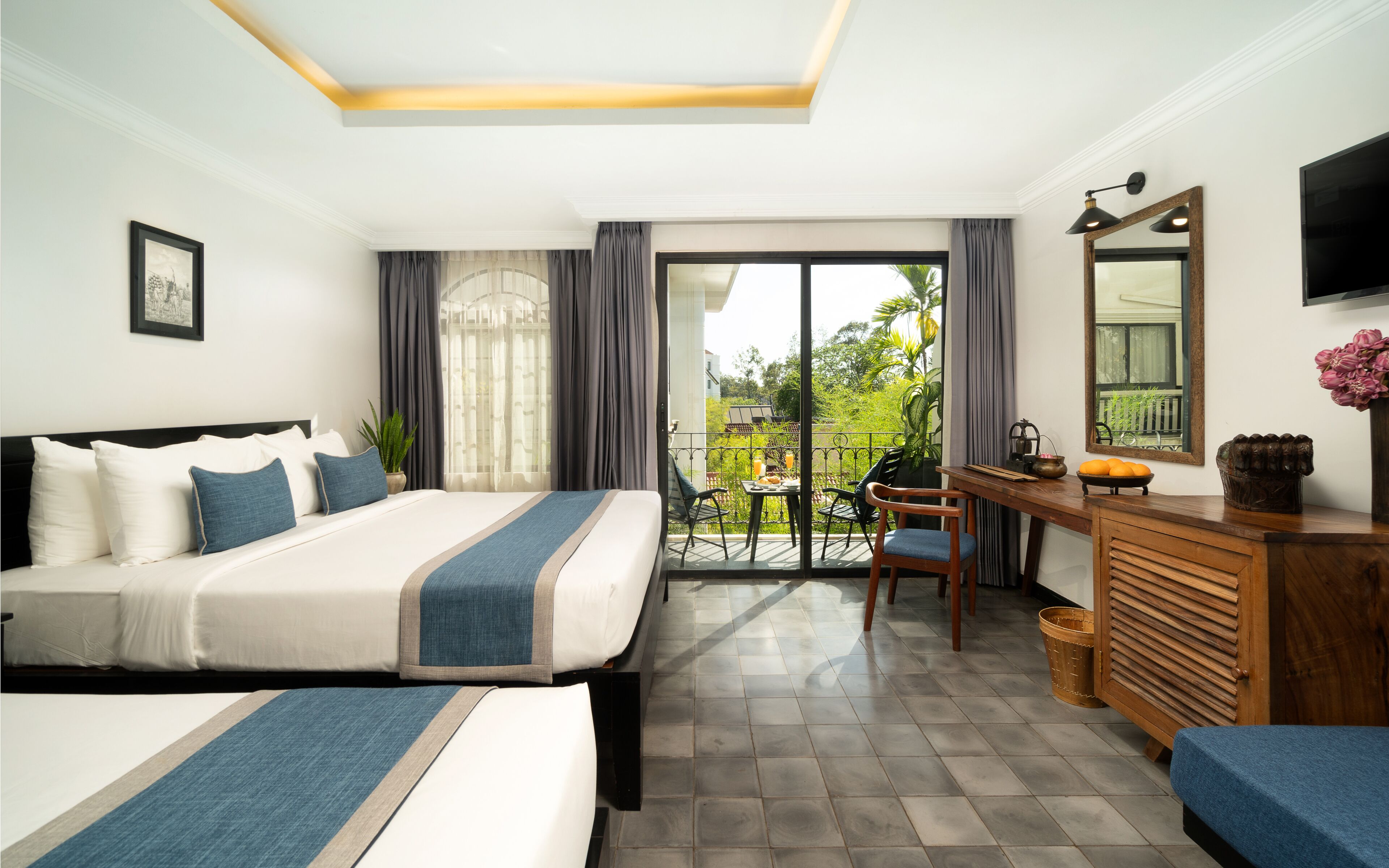 Luxury Triple Room | Minibar, in-room safe, individually decorated, individually furnished