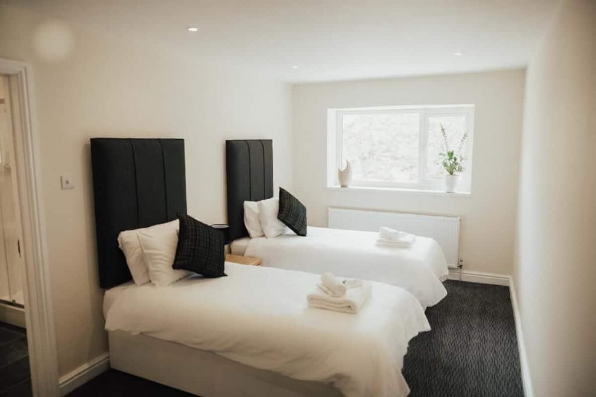 Klassieke Twin kamer | Bedden met traagschuimmatras, een minibar, een kluis op de kamer